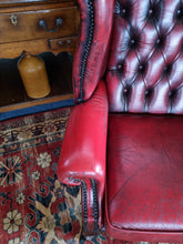 Load image into Gallery viewer, Leather Vintage Wing Back Chesterfield Armchair In Red Oxblood
