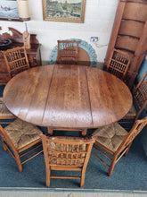 Load image into Gallery viewer, Oak Dining Table And Eight Lancashire Dining Chairs