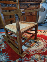Load image into Gallery viewer, Solid Oak Rocking Chair With Rush Seat - Charlotte Rose Interiors