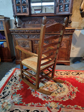 Load image into Gallery viewer, Solid Oak Rocking Chair With Rush Seat - Charlotte Rose Interiors