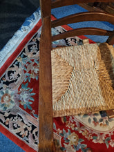 Load image into Gallery viewer, Solid Oak Rocking Chair With Rush Seat - Charlotte Rose Interiors