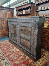 Load image into Gallery viewer, Victorian Ebonised Carved Oak Bookcase With Glazed Doors