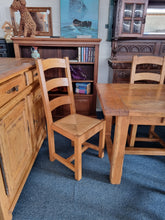 Load image into Gallery viewer, French Oak Farmhouse Extending Dining Table And Chairs With Matching Cupboard - Charlotte Rose Interiors