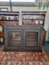 Load image into Gallery viewer, Victorian Ebonised Carved Oak Bookcase With Glazed Doors