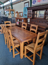 Load image into Gallery viewer, French Oak Farmhouse Extending Dining Table And Chairs With Matching Cupboard - Charlotte Rose Interiors
