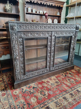 Load image into Gallery viewer, Victorian Ebonised Carved Oak Bookcase With Glazed Doors