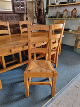 Load image into Gallery viewer, French Oak Farmhouse Extending Dining Table And Chairs With Matching Cupboard - Charlotte Rose Interiors