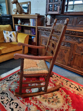 Load image into Gallery viewer, Solid Oak Rocking Chair With Rush Seat - Charlotte Rose Interiors