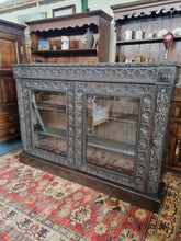 Load image into Gallery viewer, Victorian Ebonised Carved Oak Bookcase With Glazed Doors