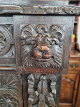 Load image into Gallery viewer, Victorian Ebonised Carved Oak Bookcase With Glazed Doors