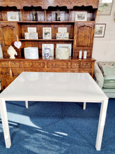 Load image into Gallery viewer, White Extending Dining Table In Metal And Glass With Six Green Perspex Dining Chairs