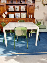 Load image into Gallery viewer, White Extending Dining Table In Metal And Glass With Six Green Perspex Dining Chairs