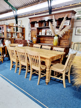 Load image into Gallery viewer, Farmhouse Plank Top Solid Pine Table With Eight Elm Dining Chairs