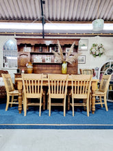 Load image into Gallery viewer, Farmhouse Plank Top Solid Pine Table With Eight Elm Dining Chairs