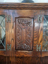 Load image into Gallery viewer, Carved Oak Glazed Dresser Handmade In The UK