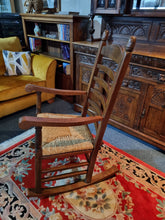 Load image into Gallery viewer, Solid Oak Rocking Chair With Rush Seat - Charlotte Rose Interiors
