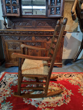 Load image into Gallery viewer, Solid Oak Rocking Chair With Rush Seat - Charlotte Rose Interiors
