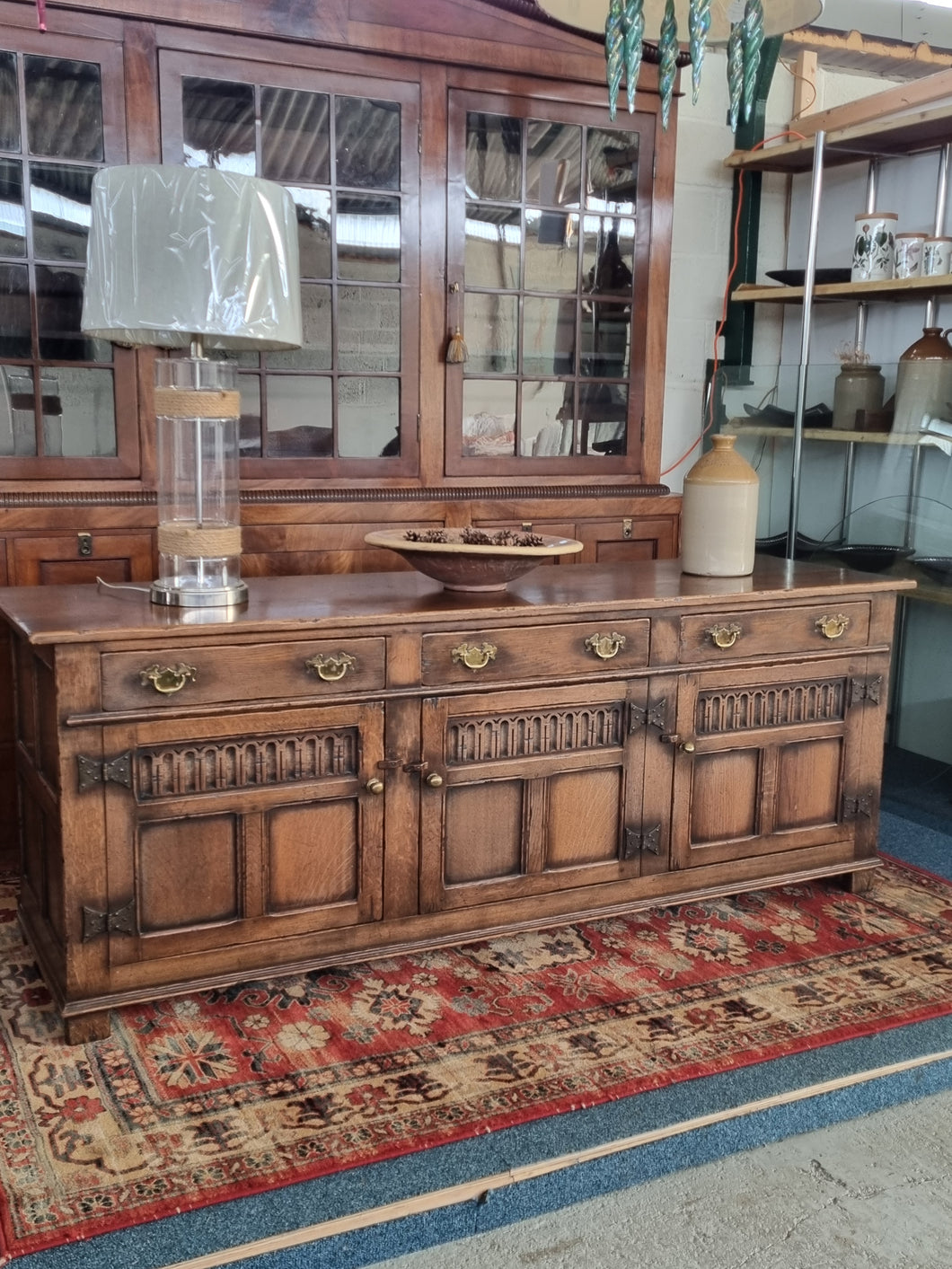 Carved Oak Dresser Base In The Style Of Titchmarsh And Goodwin