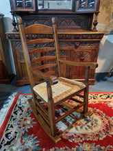 Load image into Gallery viewer, Solid Oak Rocking Chair With Rush Seat - Charlotte Rose Interiors
