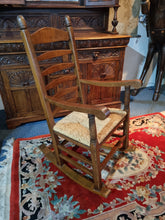 Load image into Gallery viewer, Solid Oak Rocking Chair With Rush Seat - Charlotte Rose Interiors
