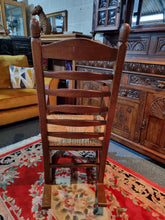 Load image into Gallery viewer, Solid Oak Rocking Chair With Rush Seat - Charlotte Rose Interiors
