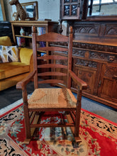Load image into Gallery viewer, Solid Oak Rocking Chair With Rush Seat - Charlotte Rose Interiors

