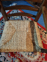 Load image into Gallery viewer, Solid Oak Rocking Chair With Rush Seat - Charlotte Rose Interiors

