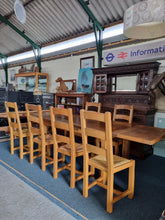 Load image into Gallery viewer, French Oak Farmhouse  Extending Dining Table  And Chairs With Matching Cupboard - Charlotte Rose Interiors
